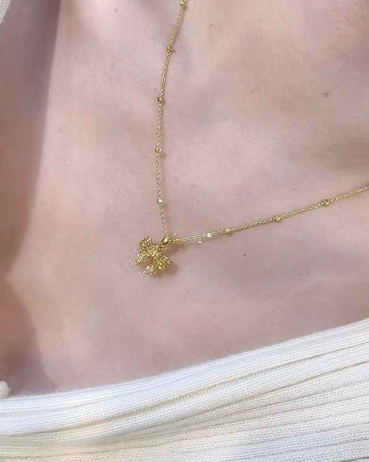 鏤空蝴蝶結墜子 細節圖